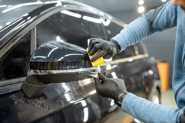 Filming car body at the vehicle service